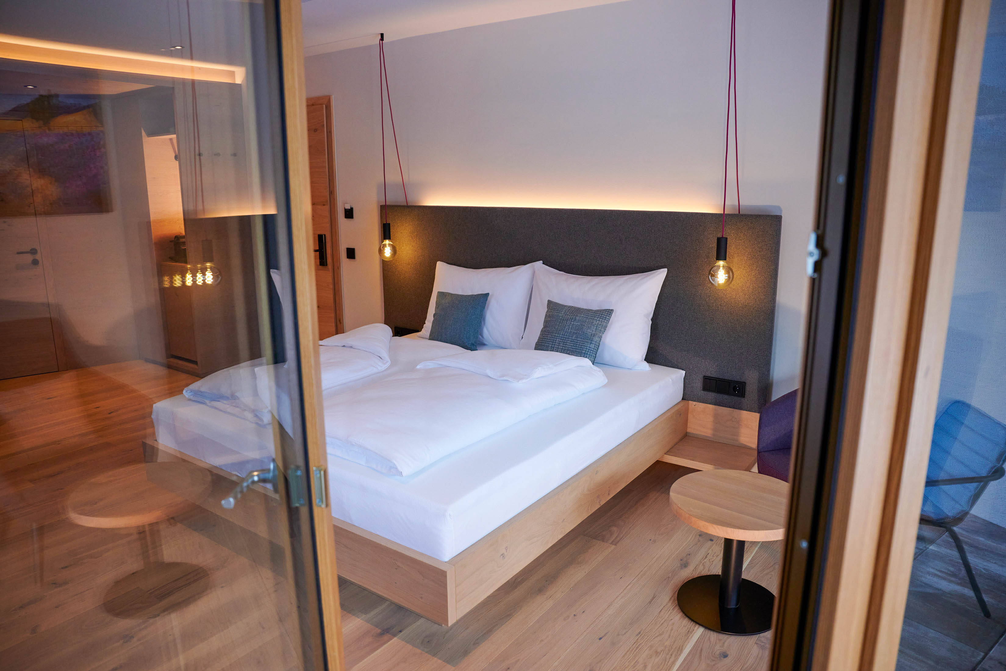 Modern double room with box spring bed at Hotel MorgenZeit.
